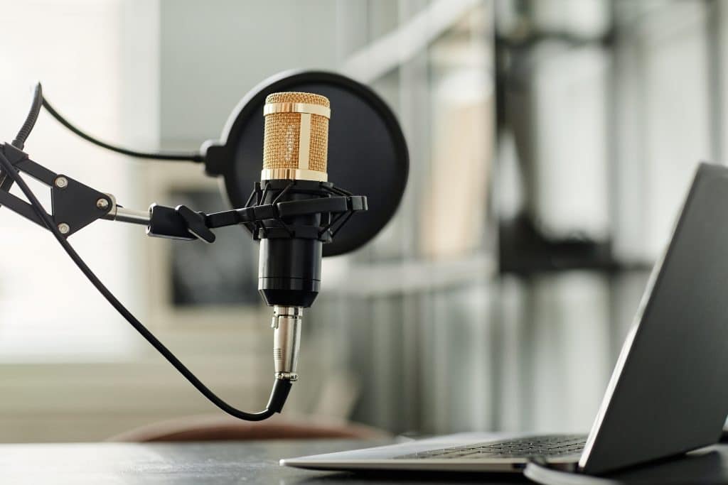 closeup of professional podcast microphone in home studio